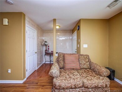 UNIQUE TILED ENTRANCE WITH COAT CLOSET