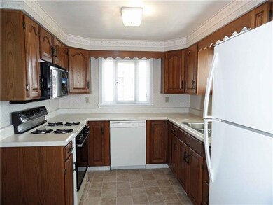 Lots of cabinets, vinyl flooring and complete appl