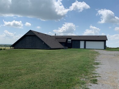 Home is partially in ground. Enter main level thro