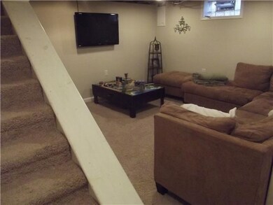 Family Room Glassblock windows & plush carpeting