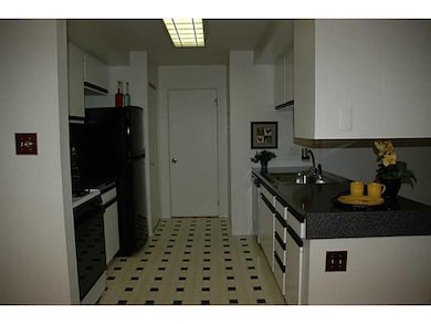 Kitchen. Kitchen features a large pantry area, and
