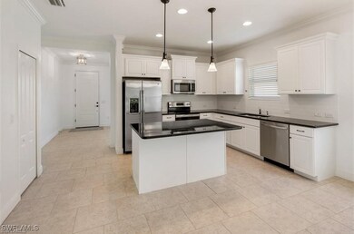 Kitchen featuring appliances with stainless steel