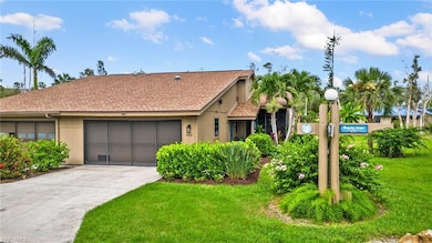 View of front of house featuring a garage and a fr