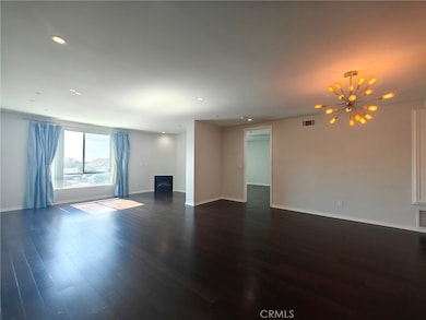 Spacious and Open living room/formal dining with fireplace