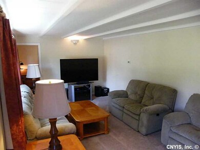 Living Room. Room features accent lighting on side