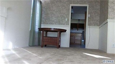 View of dining room area from the fireplace in the