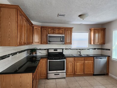 Another view of the kitchen