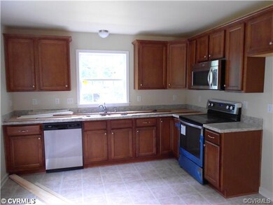 Brand new kitchen with appliances. To be built. This picture is a representation of a similar house.