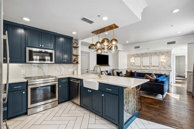 Kitchen featuring sink, blue cabinetry, kitchen pe