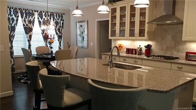Beautiful open kitchen with large island and brigh