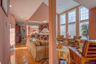 Wall of windows in the open family room kitchen