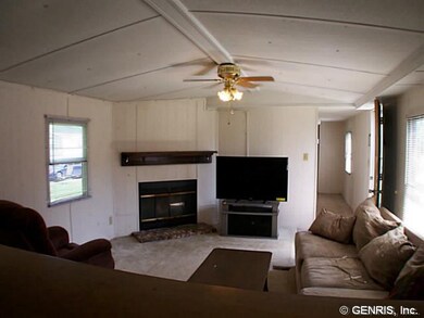 Living Room Living room w/wood burning fireplace &