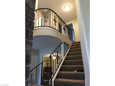 Stairwell with new carpet and beautiful Metal Decorative handrails