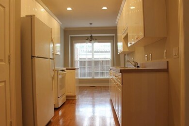 Kitchen with gray painted walls.