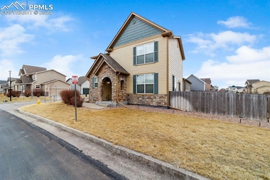 View of front of house with a front yard