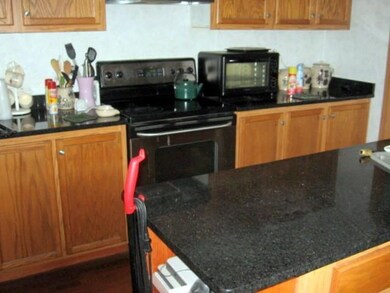 Center island in kitchen. Granite...