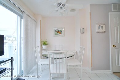 Eat in Kitchen with Sliders to Balcony