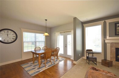 Dining with open-in patio doors w/ in-window blind