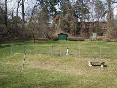 Yard/Garden. The spacious  & partially fenced yard