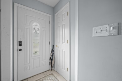 Entryway featuring tile patterned floors