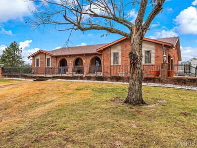 Single story home with a front yard