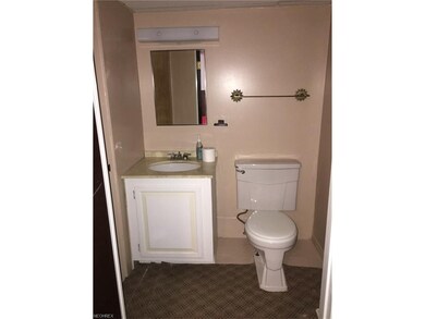 This full bathroom is conveniently located off of the big finished rec room.