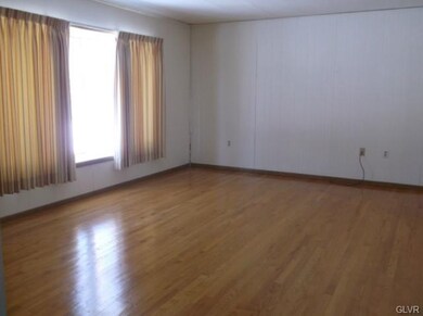 Family Room with door to Patio and door into Garag