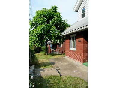 Exterior Front. THE FRONT YARD AREA.