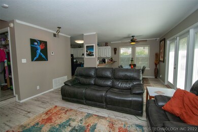 Open floor plan living/dining/kitchen