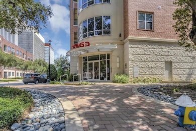 Covered balcony with relaxing views of the surrounding trees and neighborhood.
