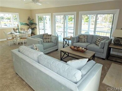 The upstairs family room with a 24 foot outdoor de