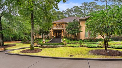 Enjoy the lush landscaping on just under an acre.
