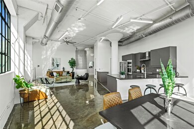 Kitchen featuring stainless steel appliances, wall