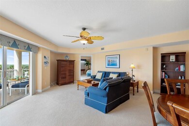 Living room has access to the main balcony and vie