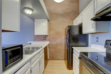 White cabinets and black appliances