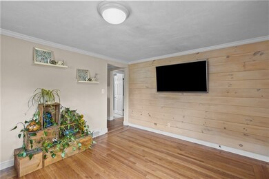 Living Room leading to hallway to Bedrooms and ent