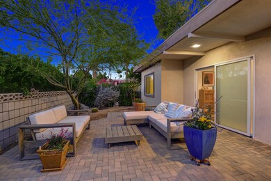ENTRY COURTYARD ACROSS NIGHT MLS