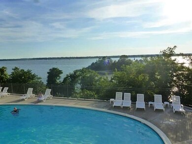 Exterior Front. POOL WITH A WATER VIEW..