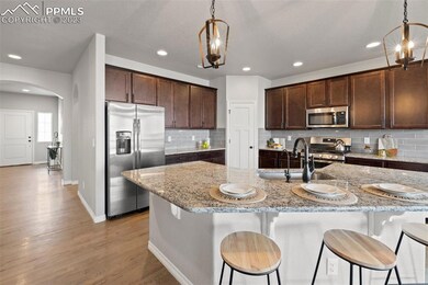 This kitchen has it all! Granite counters, stainle