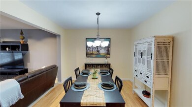 Large open dining area nestled between the living 