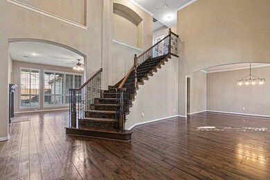 Elegant stairway with view Living and dining rooms