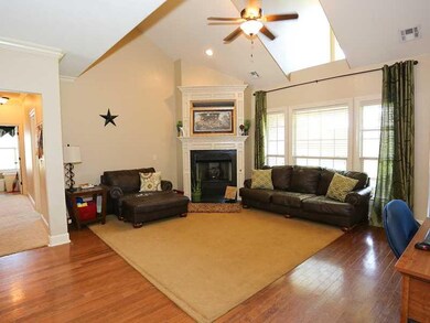 Living Room. vaulted ceiling with great windows an