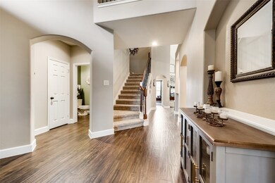 A grand entrance with gorgeous tile floors that stretch throughout the first floor. Can't you just image yourself walking into this beautiful space everyday?