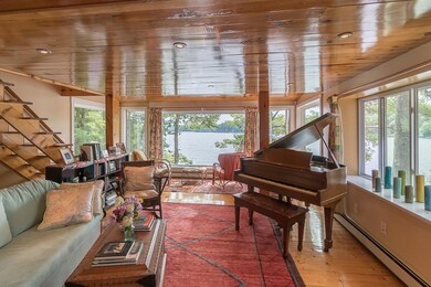 Living room with stairs to master.