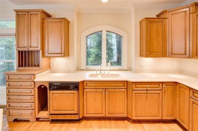 Custom built kitchen cabinets line all the way around the kitchen for extra storage.