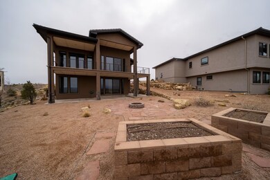 2 raised garden beds and firepit