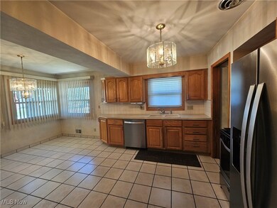 Kitchen showing large eating area