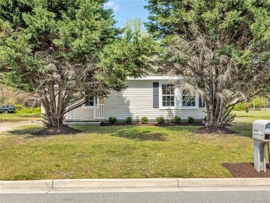 Front of the home with vinyl siding all the way ar