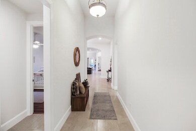 Two of Four Bedrooms are just to the left of this Grand Entryway... Before we go there lets look at the heart of the Home!