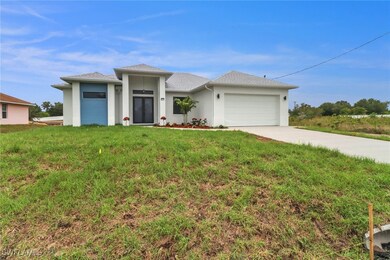 Prairie-style house featuring an attached garage,